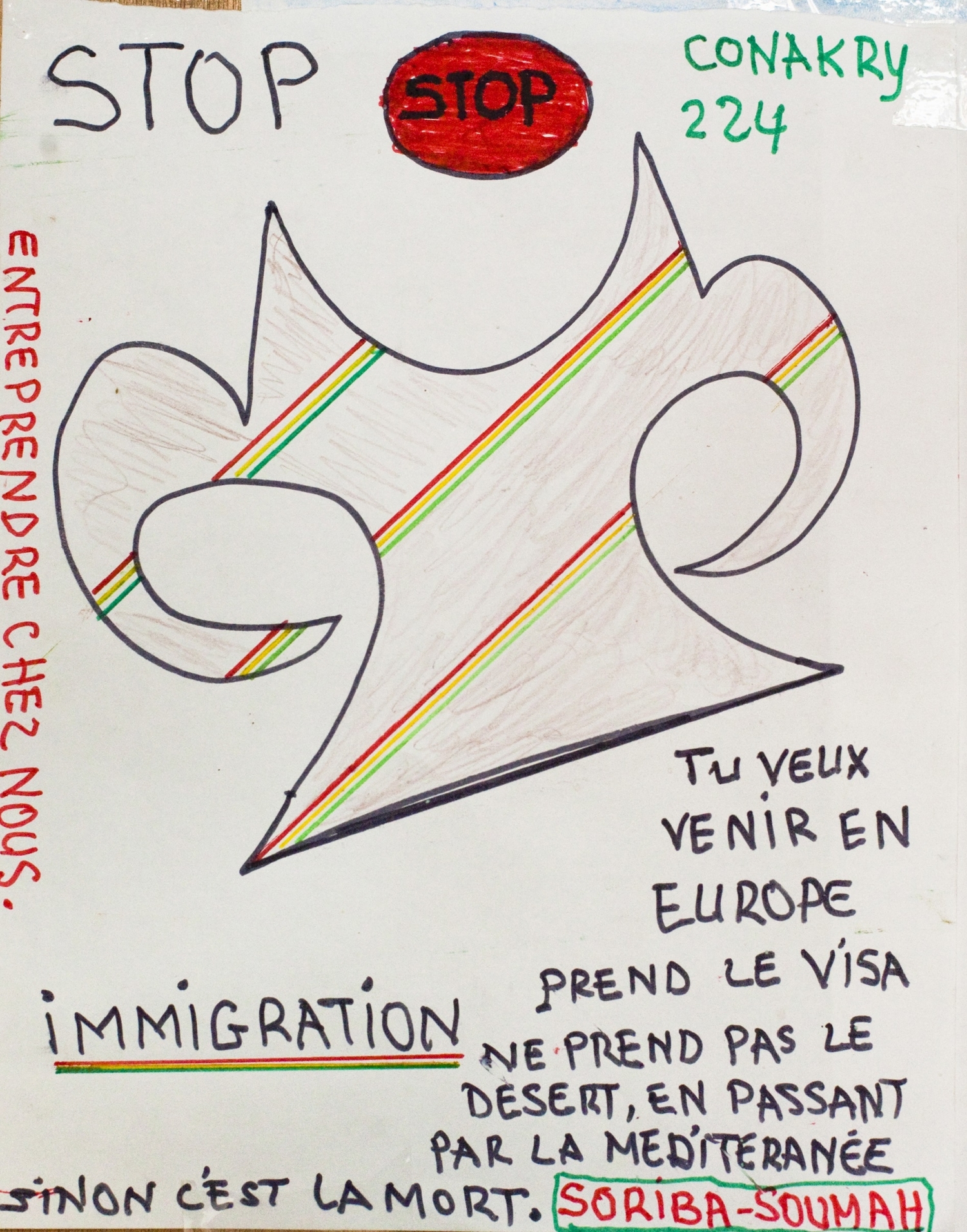 Le dessin de Sorbia Soumah appelant les migrants à ne pas s’aventurer dans le désert africain et la Méditerranée (Crédits : Pauline Rey)